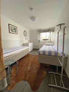 Postel nebo postele na pokoji v ubytování Hults-Boaryd Golf och B&B