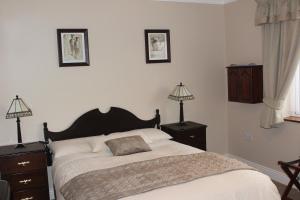Letto o letti in una camera di Dunross House B&B