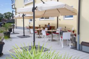 Een restaurant of ander eetgelegenheid bij Hotel Andrea