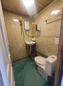 Koupelna v ubytování Ziczac Homestay Đà Lạt + 36 fotografií