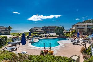 Swimming pool sa o malapit sa Seascape Beach Resort