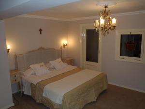 Postel nebo postele na pokoji v ubytování GM Rooms Boutique Hotel