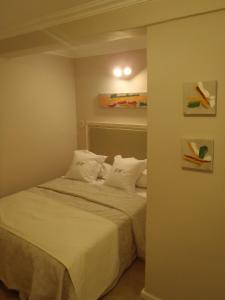Postel nebo postele na pokoji v ubytování GM Rooms Boutique Hotel