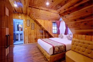 Postel nebo postele na pokoji v ubytování Zambala Retreat & Spa Darjeeling