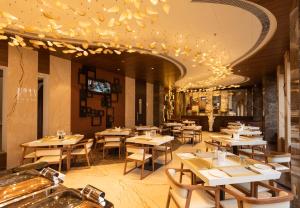 Restorāns vai citas vietas, kur ieturēt maltīti, naktsmītnē Hotel Park Elanza Coimbatore