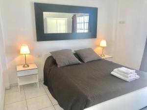 Postel nebo postele na pokoji v ubytování Villa Las Vistas Costa Adeje