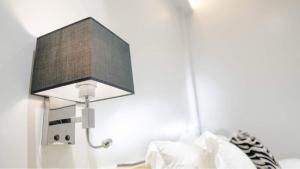 Postel nebo postele na pokoji v ubytování Radlett Residences Hotel - Tuguegarao