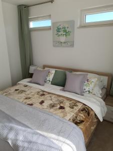 Posteľ alebo postele v izbe v ubytovaní La Dolce Vita Apartments Unit 2