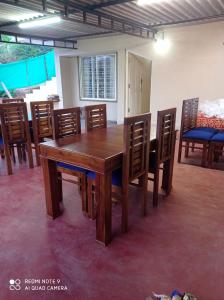 Posezení v ubytování Cauvery Homestay