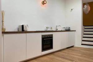 Кухня или мини-кухня в LE ZOLA Appartement familial
