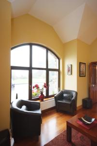 Area soggiorno di Dunross House B&B