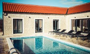 Bazén v ubytování Luxury Villa Mala nebo v jeho okolí