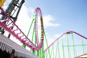 a pink roller coaster in a carnival park at Great Deals at The Grange, Ingoldmells in Skegness