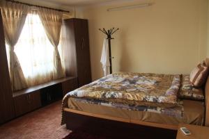 Cama o camas de una habitación en Hotel Mountain Gateway
