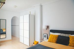Postel nebo postele na pokoji v ubytování Aparthotel Costa Blanca