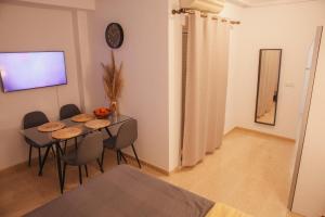 TV a/nebo společenská místnost v ubytování Aparthotel Costa Blanca