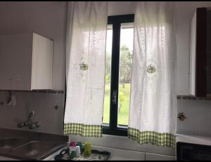 Kuchyň nebo kuchyňský kout v ubytování Villa Il Carrubo - Basilicata