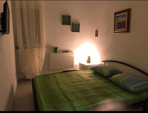 Postel nebo postele na pokoji v ubytování Villa Il Carrubo - Basilicata