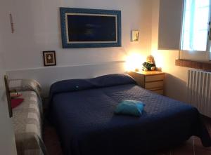 Postel nebo postele na pokoji v ubytování Villa Il Carrubo - Basilicata