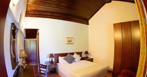 A bed or beds in a room at Self Catering Chalet Kulina