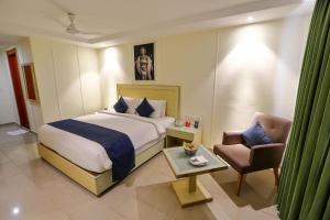 Zip By Spree Hotels Hyde Goa客房内的一张或多张床位