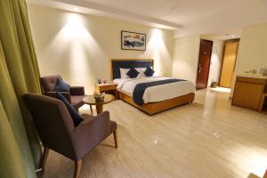 Zip By Spree Hotels Hyde Goa客房内的一张或多张床位