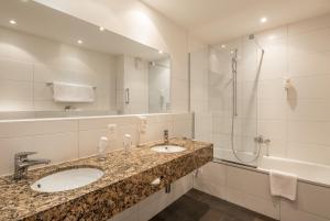 Koupelna v ubytování Hotel Monopol Luzern