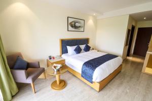 Zip By Spree Hotels Hyde Goa客房内的一张或多张床位