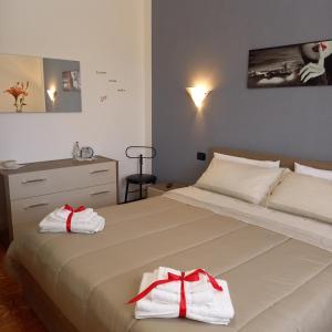 A bed or beds in a room at AndEli DUE