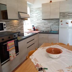 A kitchen or kitchenette at AndEli DUE