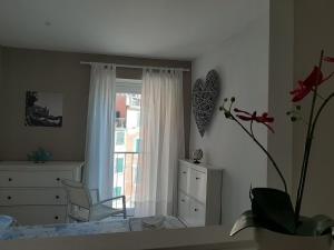 Posteľ alebo postele v izbe v ubytovaní Pepita di Rio