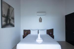 Katil atau katil-katil dalam bilik di Oxygen Jungle Villas & Spa