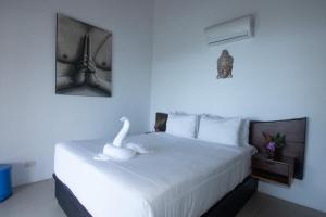 Katil atau katil-katil dalam bilik di Oxygen Jungle Villas & Spa