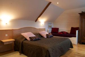 Postel nebo postele na pokoji v ubytování Relais Saint Aubin