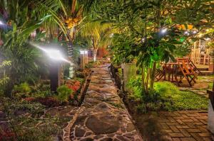 Κήπος έξω από το The Wisma Pulau Merah