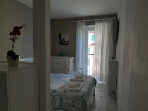 Posteľ alebo postele v izbe v ubytovaní Pepita di Rio
