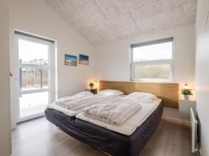 Postel nebo postele na pokoji v ubytování Holiday home Fanø CXXIV