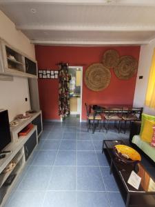 a living room with a couch and a table at Kikiki House in Puerto del Rosario