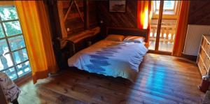 מיטה או מיטות בחדר ב-Chalet Alpin