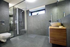 Kúpeľňa v ubytovaní Apartamenty Minimal House