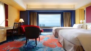 Postel nebo postele na pokoji v ubytování Hotel New Otani Makuhari
