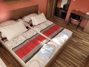 Katil atau katil-katil dalam bilik di Hotel Gól Prostějov