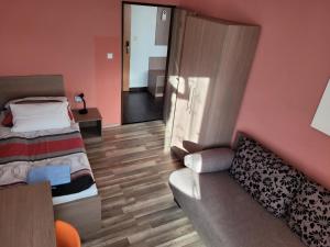 Katil atau katil-katil dalam bilik di Hotel Gól Prostějov