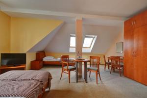 Postel nebo postele na pokoji v ubytování Hotel La Passionaria