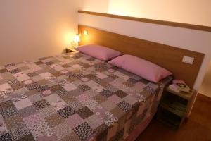 Postel nebo postele na pokoji v ubytování Giuliva B&B