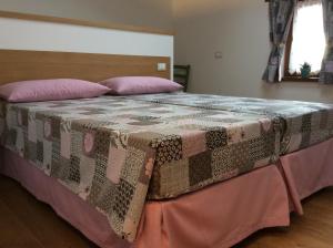 Postel nebo postele na pokoji v ubytování Giuliva B&B
