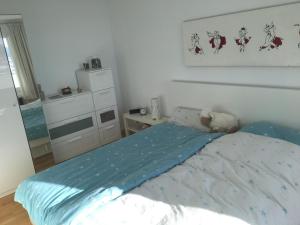 Ein Bett oder Betten in einem Zimmer der Unterkunft Seaside