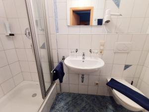 Koupelna v ubytování BodenSEE Gästehaus Tettnang ALBERGO