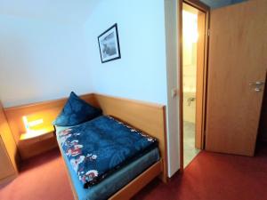 Postel nebo postele na pokoji v ubytování BodenSEE Gästehaus Tettnang ALBERGO