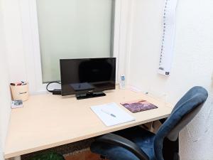 TV a/nebo společenská místnost v ubytování BodenSEE Gästehaus Tettnang ALBERGO